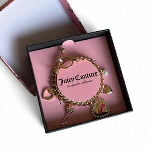 New In Box Trendy Y2K Juicy Couture gold charm bracelet with multiple charms